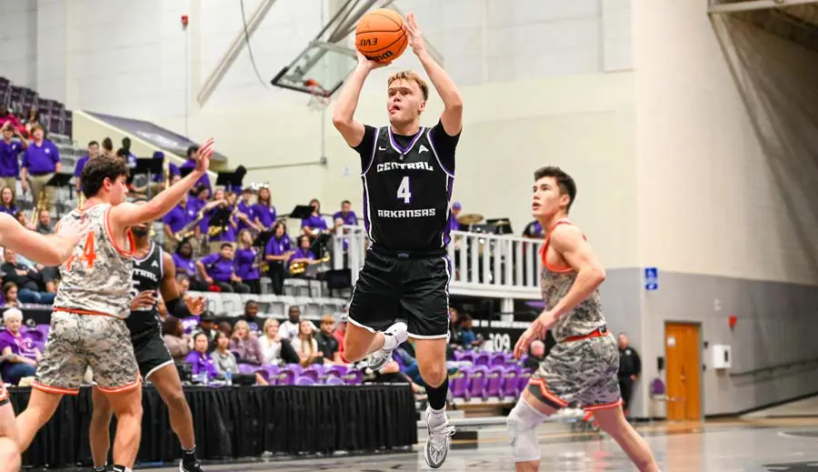 mens basketball player taking a shot