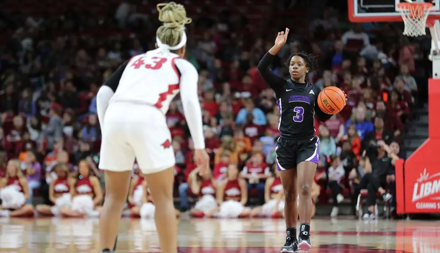 Womens basketball player calling a play