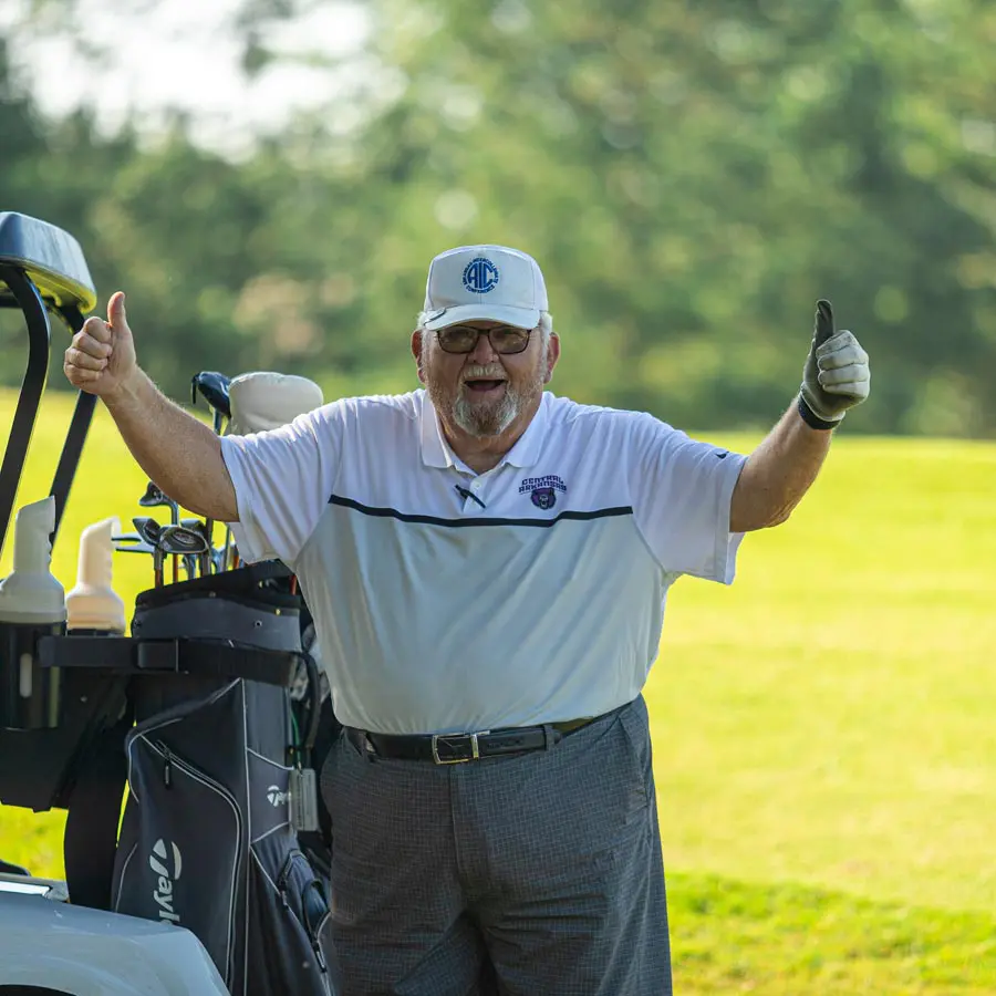 golfer giving two thumbs up